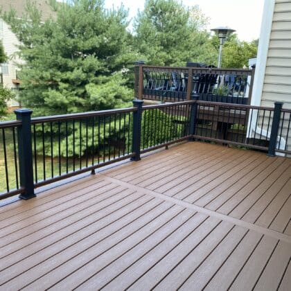 Photo of a composite deck with black railing