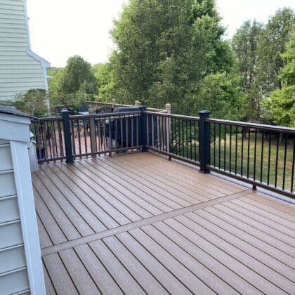 Photo of a composite deck with black railing