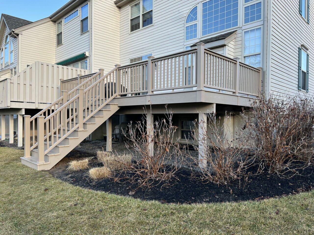 Photo of an elevated composite deck with railing