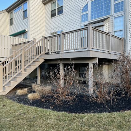 Photo of an elevated composite deck with railing