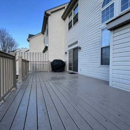 Photo of an open composite deck with railing