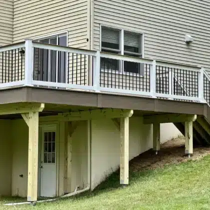 Elevated Composite Deck with Black railings and stairs - Deck contractors near me in Maple Glen PA