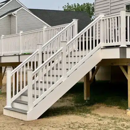 Elevated Composite Decking Project with timbertech stairs and white vinyl railings - Deck building contractors in Pipersville PA