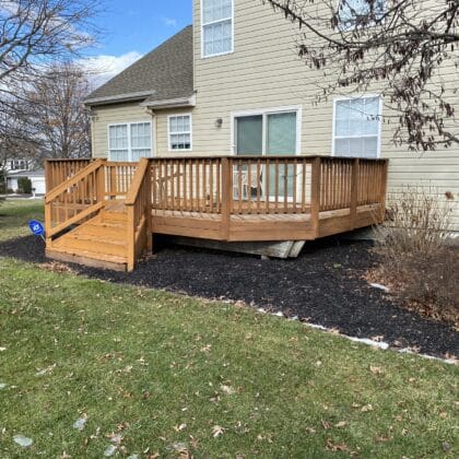 Photo of a wooden deck that will be replaced