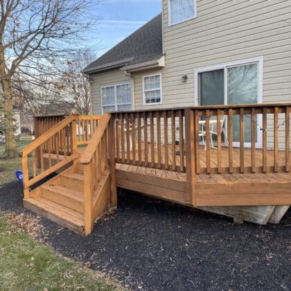 Photo of a wooden deck that will be replaced