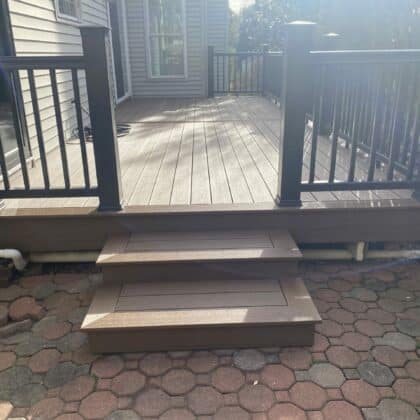 Photo of composite deck steps and deck railing