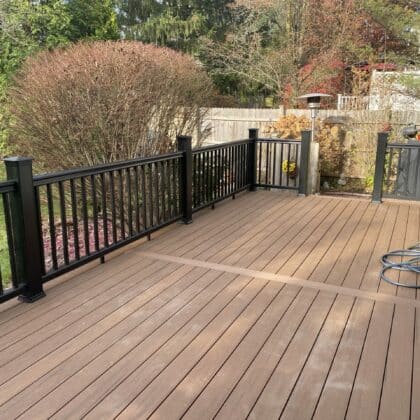 Photo of composite deck with center inlay and deck railing