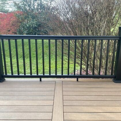 Photo of composite deck with center inlay and deck railing