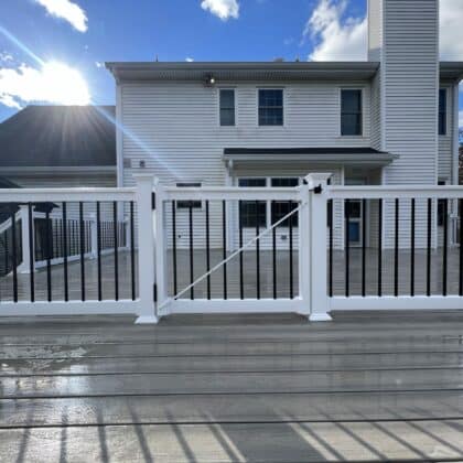 Photo of a deck railing and gate