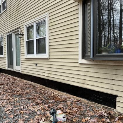 Photo of area along home prepared for new deck to be attached