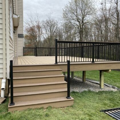 TimberTech Composite Deck with stairs and black aluminum Railings