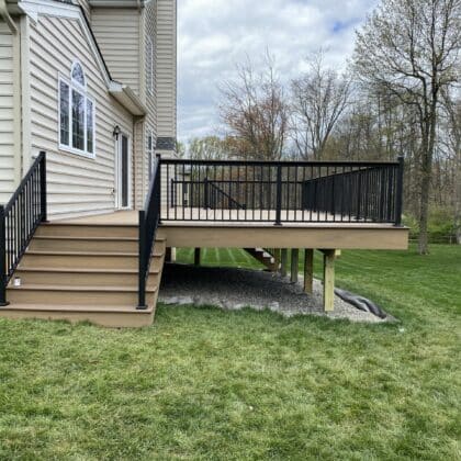 Composite deck with stairs and railings - TimberTech Decking projects