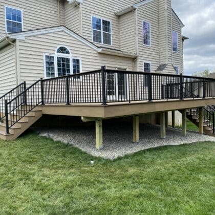 Composite deck with stairs and railings - TimberTech Decking projects