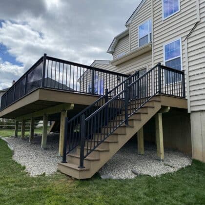 Composite deck with stairs and railings - TimberTech Decking projects