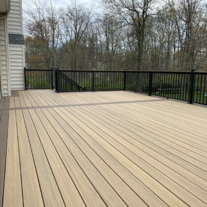 Composite decking project with Black railings in Perkasie PA - TimberTech Legacy Composite Boards