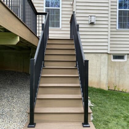 Composite deck with stairs and railings - TimberTech Decking projects