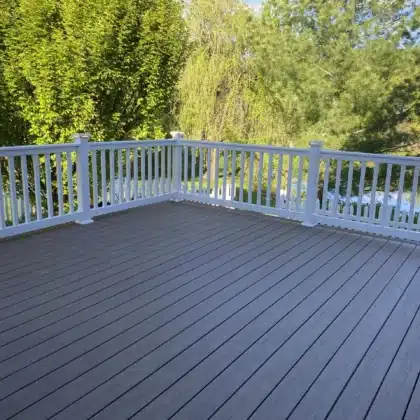 Timbertech decking boards with white vinyl railings and lighting - Deck contractor in Chester Springs PA