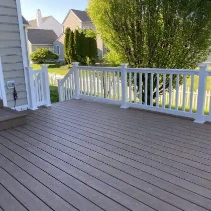 Timbertech decking project with white vinyl railings and lighting - Deck contractors in Chester Springs PA