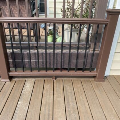 Photo of deck connecting to the house with railing