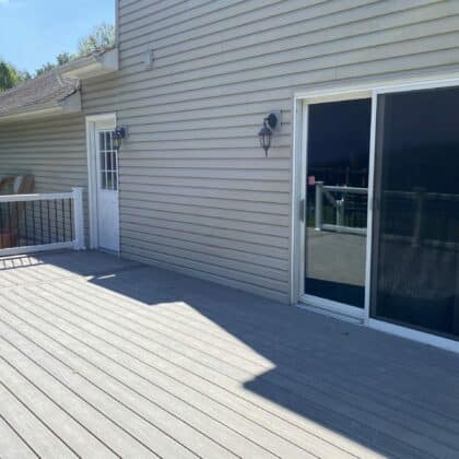 Photo of deck full view with back door