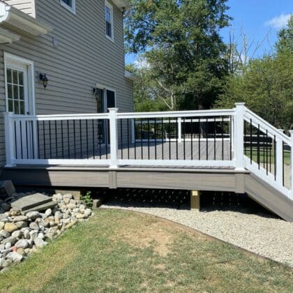 Left side view of deck with white railing