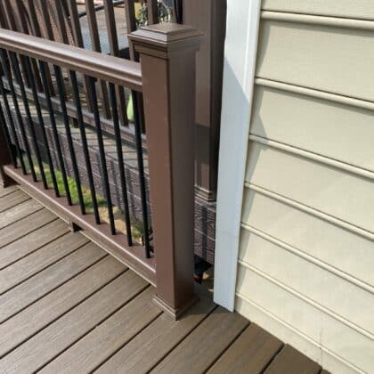 Photo of railing tied into the deck