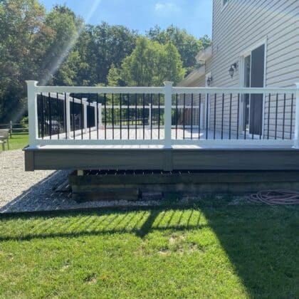 Side view of deck with white railing