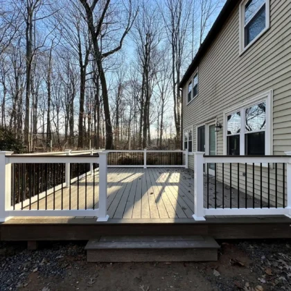 Composite Deck with white vinyl railings - Custom Deck Builders in Doylestown, PA