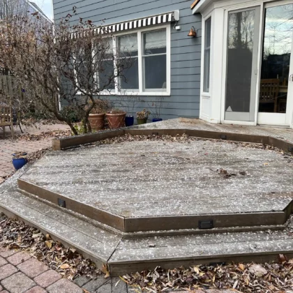 Photo of an old wood deck that is to be removed for a renovation project