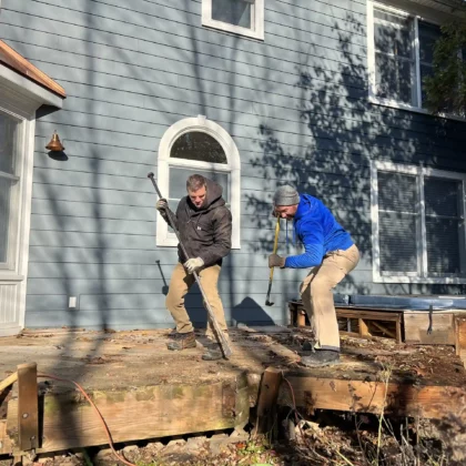 Photo of a deck crew removing a deck for a renovation project