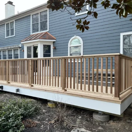 Photo of a deck made of cedar with cedar railing