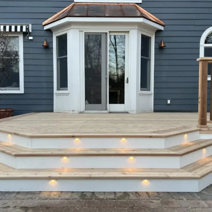 Photo of a deck made of cedar with cedar railing