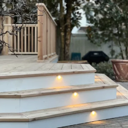 Photo of cedar deck steps with in-step lights