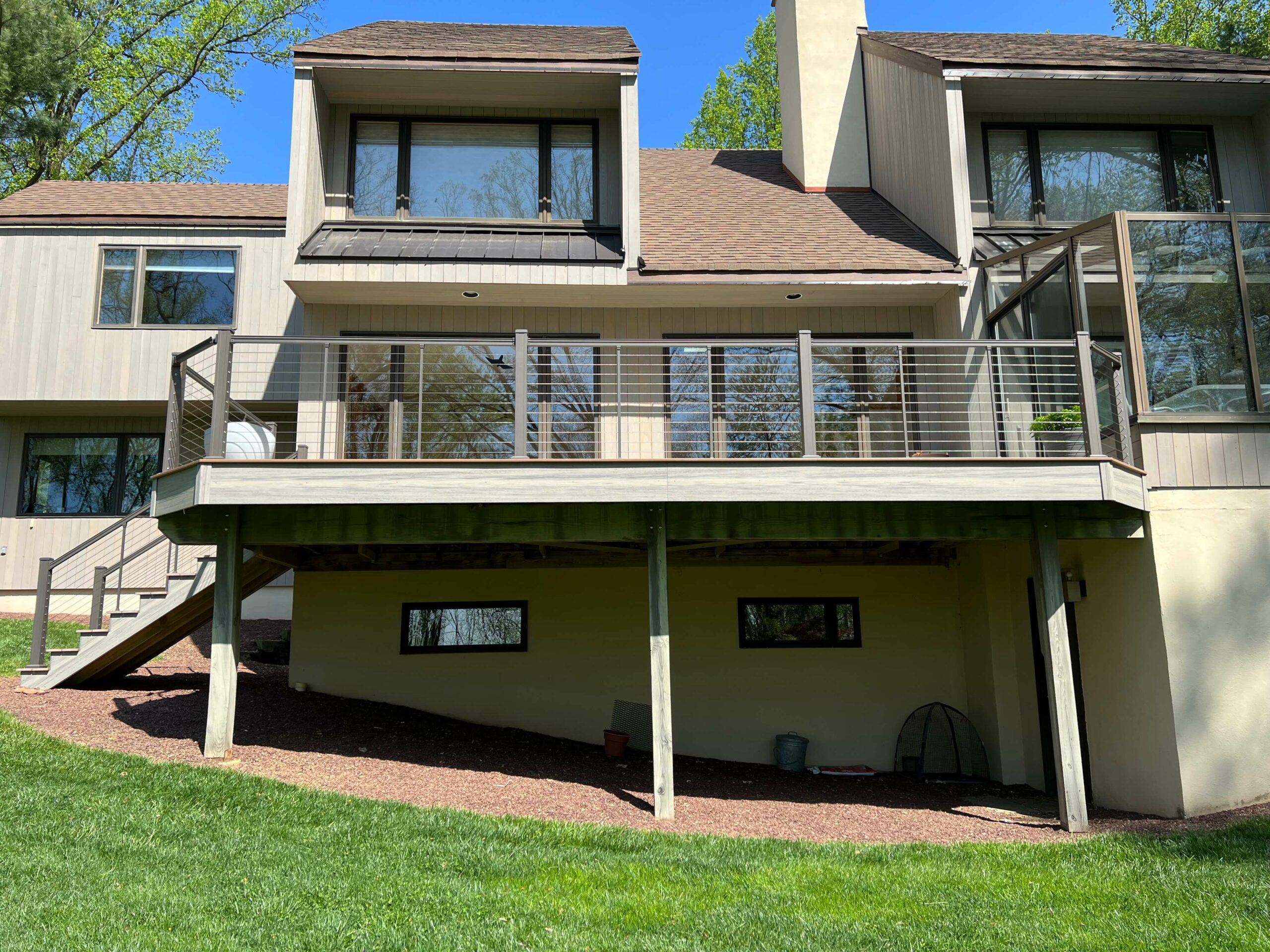 photo of multi-level deck with cable railing - Custom multi-level Deck builder and contractor Bucks & Montgomery County Pennsylvania