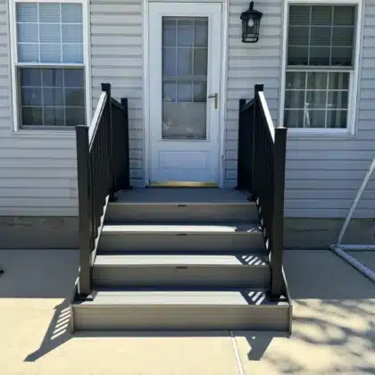 Composite stairs with black railings in Fountainville, PA