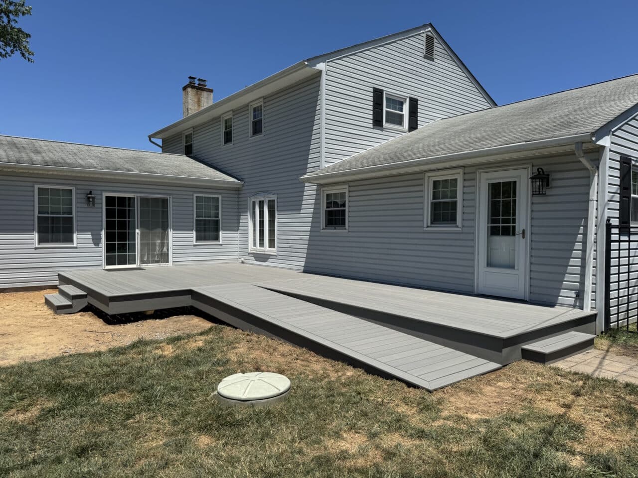 Completed gray deck with clean, modern design.