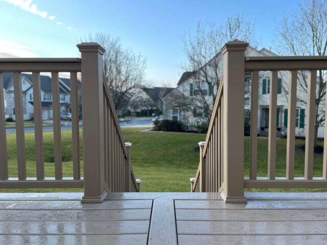 photo of a composite deck with composite deck railing - Deck Railings Ideas