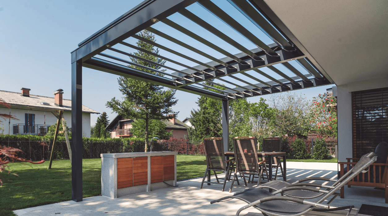 photo of a louvered roof pergola - Louvered Pergolas in Deck with patio