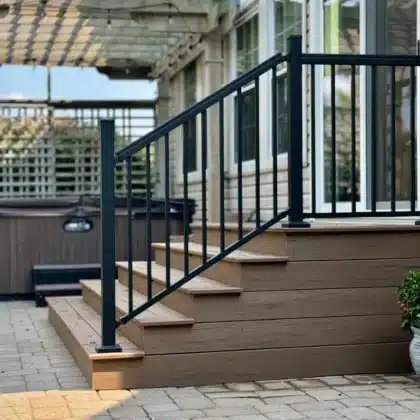 Composite Deck steps with black aluminum railings